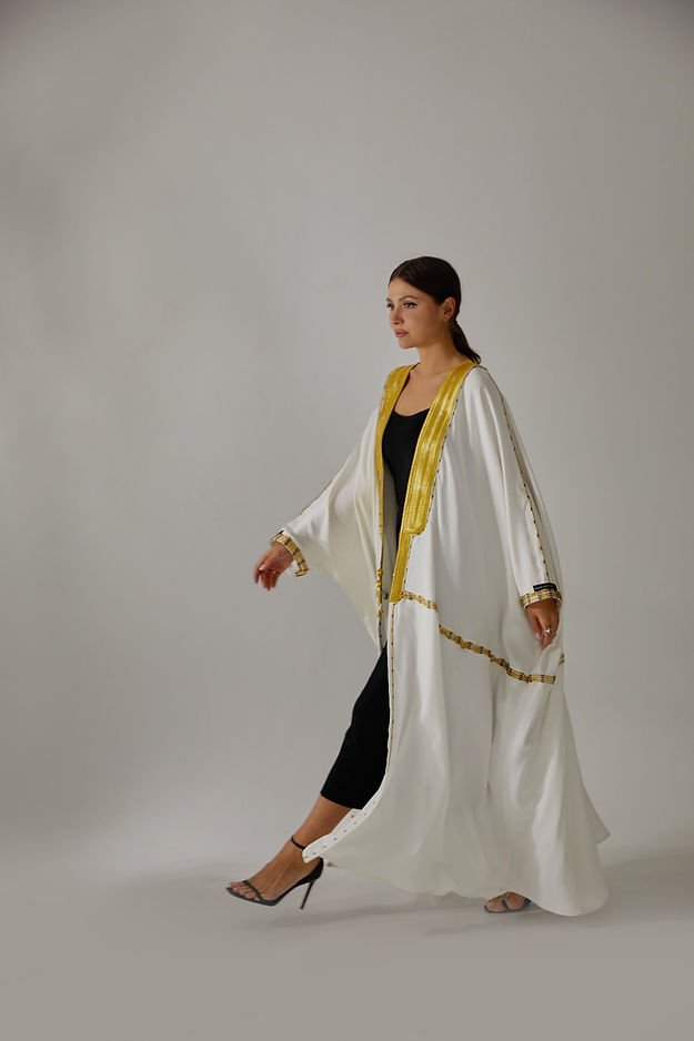 c9b50b_d708df76c2ae4670b01e8f61c237d6e4mv2.jpg White Bisht - Image 1